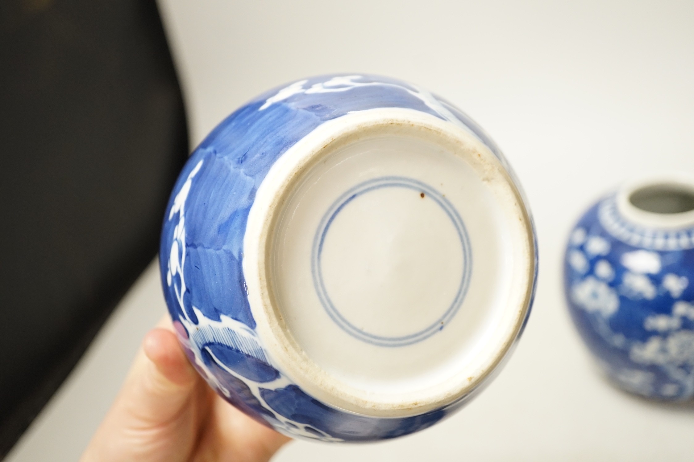 A pair of Chinese Blue and white prunus ginger jars. 15cm tall